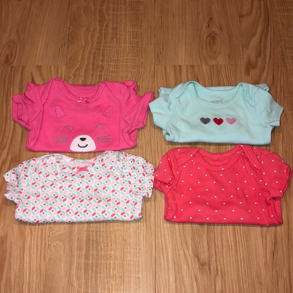 Carter’s girl’s NB onesies